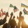 people_waving_international_flags_at_sunrise
